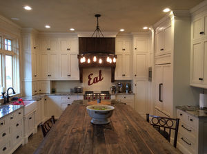 Bright custom kitchen with white cabinetry