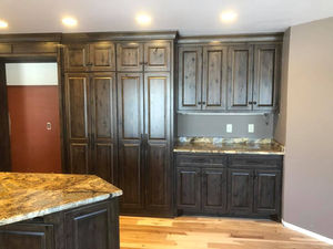 Built-in cabinetry with stone countertop
