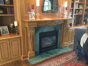 Custom fireplace surround and cabinets