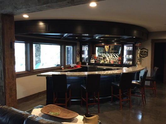 Custom wood cabinetry in a bar area